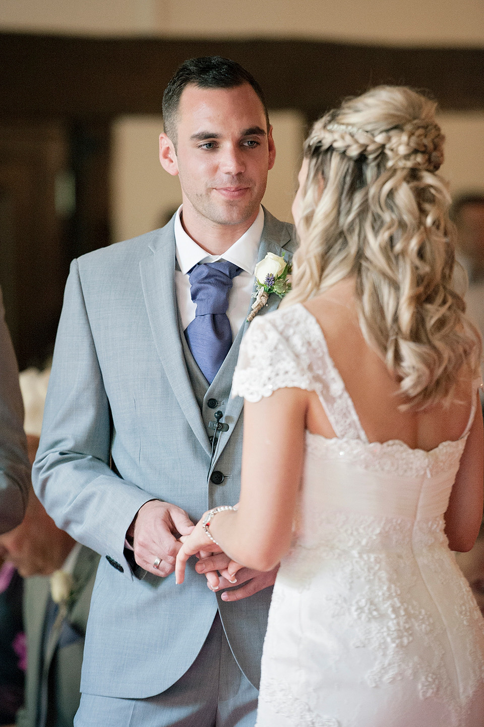 The bride wears a Bo & Luca headpiece and pretty Pronovias gown for her Summer country house wedding at Woodhall Manor in Suffolk. Photography by Kathryn Hopkins.