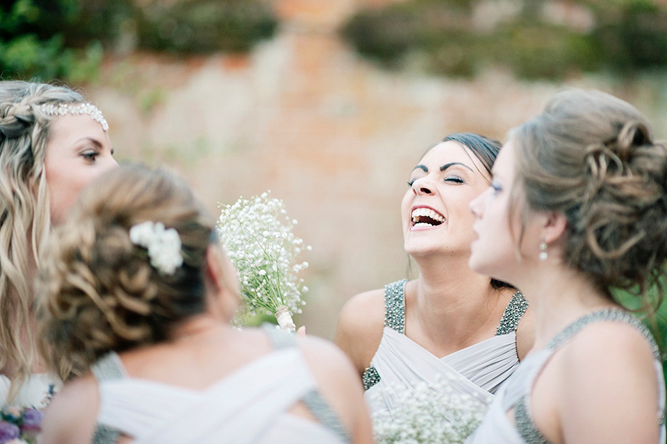 The bride wears a Bo & Luca headpiece and pretty Pronovias gown for her Summer country house wedding at Woodhall Manor in Suffolk. Photography by Kathryn Hopkins.