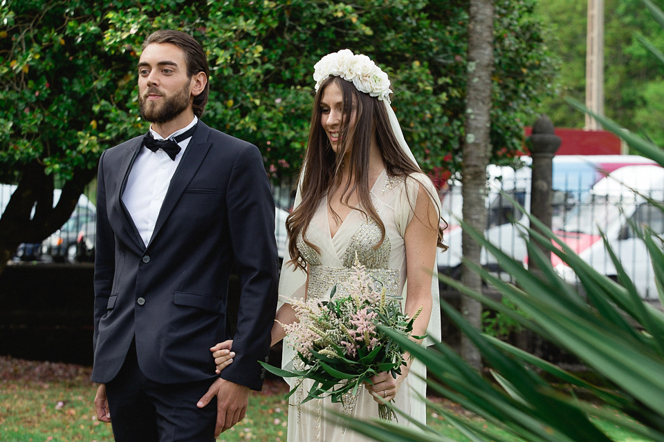 A bride wearing a sequin BHLDN gown for her boho-luxe outdoor ceremony wedding in Spain. Photography by Susana Rios. Boho Luxe wedding, sequin BHLDN wedding dress, BHLDN flowergirl tutus, outdoor wedding ceremony, wedding in Spain, floral crown // Susana Rios Photography.