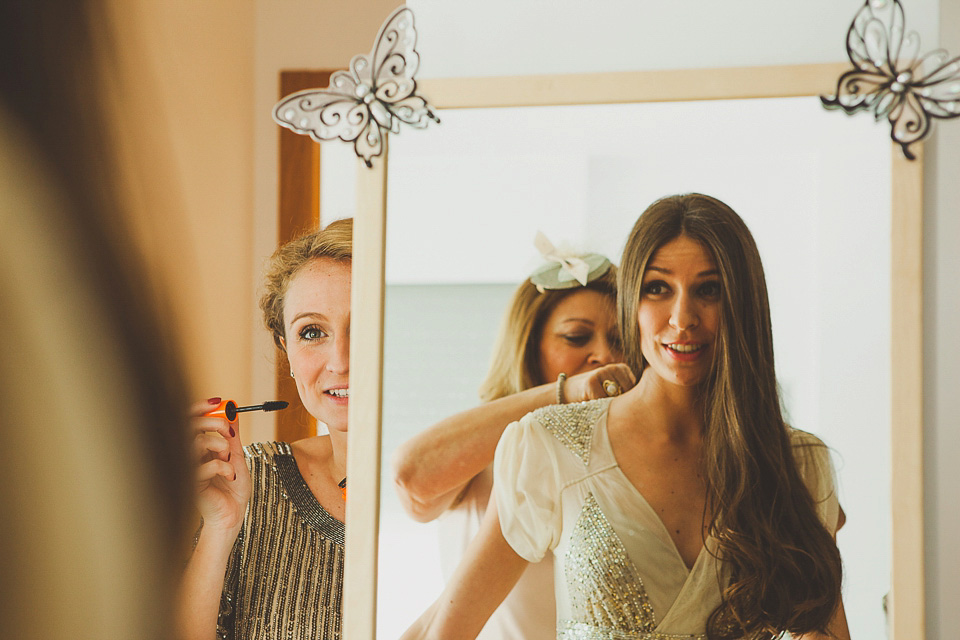 A bride wearing a sequin BHLDN gown for her boho-luxe outdoor ceremony wedding in Spain. Photography by Susana Rios. Boho Luxe wedding, sequin BHLDN wedding dress, BHLDN flowergirl tutus, outdoor wedding ceremony, wedding in Spain, floral crown // Susana Rios Photography.