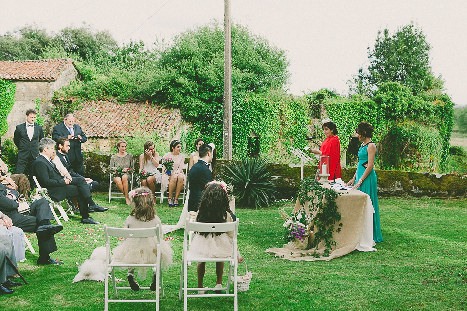 A bride wearing a sequin BHLDN gown for her boho-luxe outdoor ceremony wedding in Spain. Photography by Susana Rios. Boho Luxe wedding, sequin BHLDN wedding dress, BHLDN flowergirl tutus, outdoor wedding ceremony, wedding in Spain, floral crown // Susana Rios Photography.
