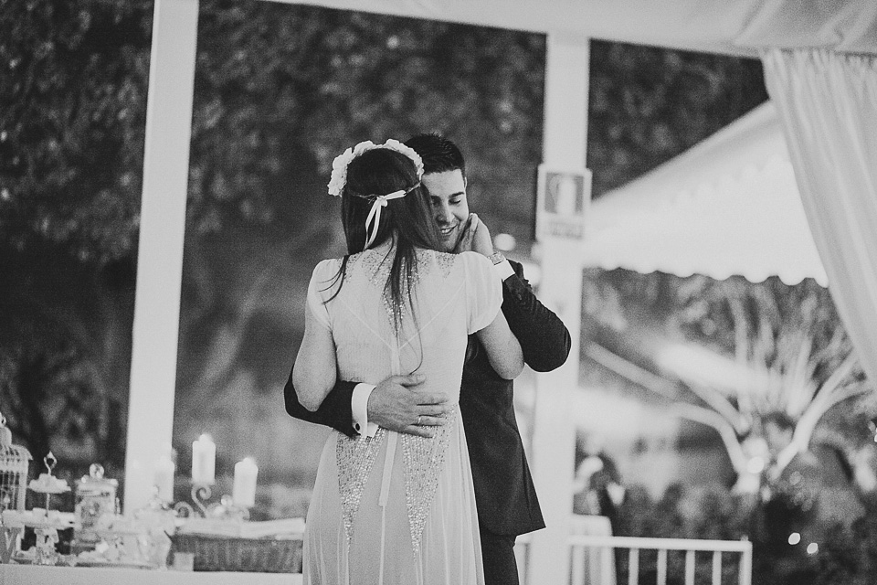 A bride wearing a sequin BHLDN gown for her boho-luxe outdoor ceremony wedding in Spain. Photography by Susana Rios. Boho Luxe wedding, sequin BHLDN wedding dress, BHLDN flowergirl tutus, outdoor wedding ceremony, wedding in Spain, floral crown // Susana Rios Photography.