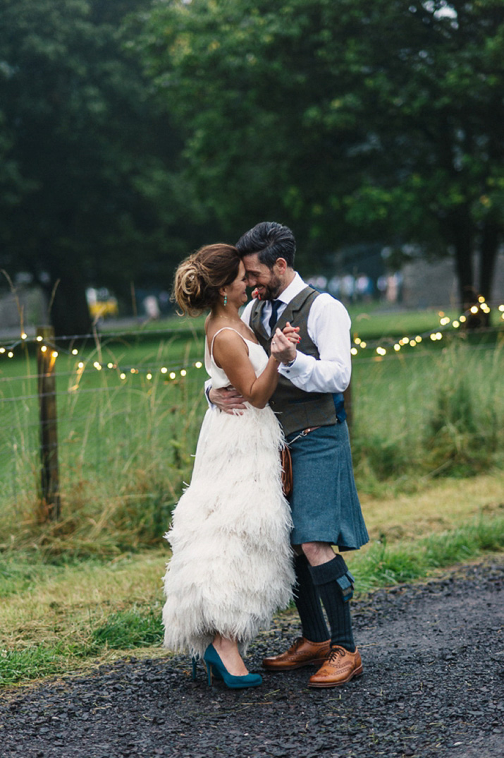 wpid365807 charlie brear ostrich feather skirt scottish barn wedding 63