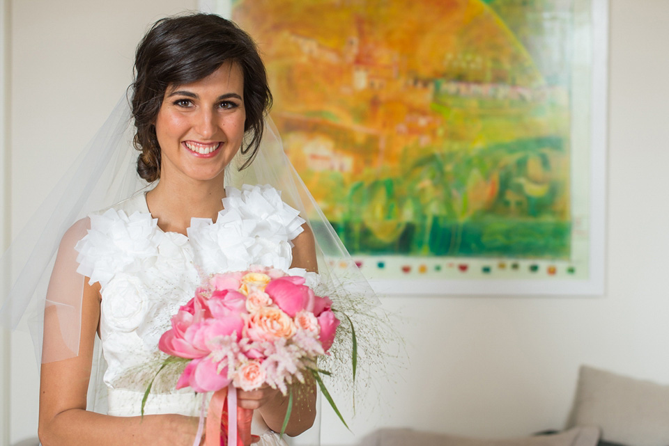 A vibrant pink, coral and colourful Italan Palazzo wedding with a bride wearing Comme des Garçons. Photography by Giuli e Giordi.