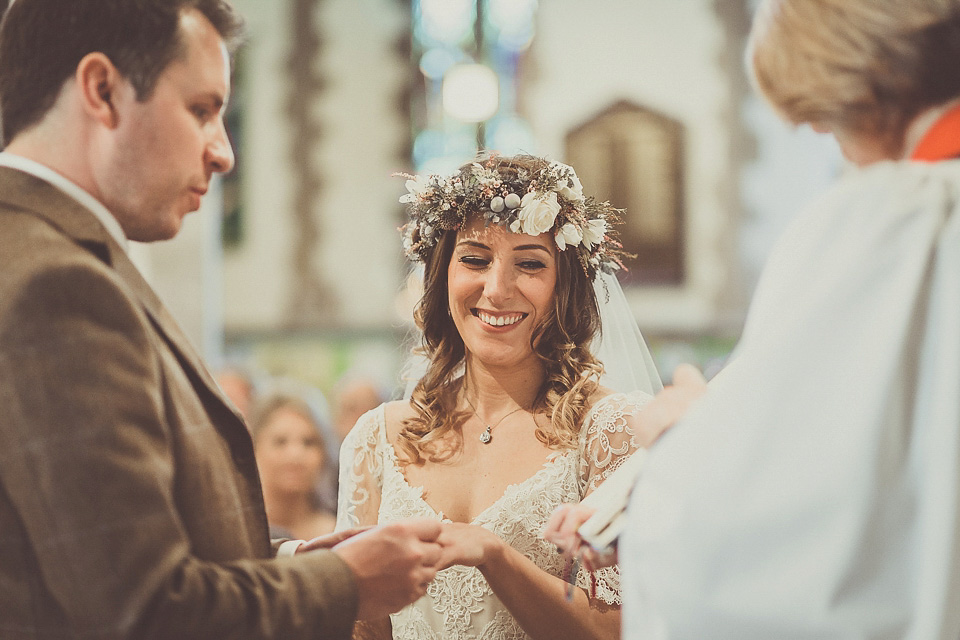 The bride wears YolanCris for her rustic, late Autumn barn wedding at Ramster Hall in Chiddingford, Surrey. Photography by Michelle Lindsell.