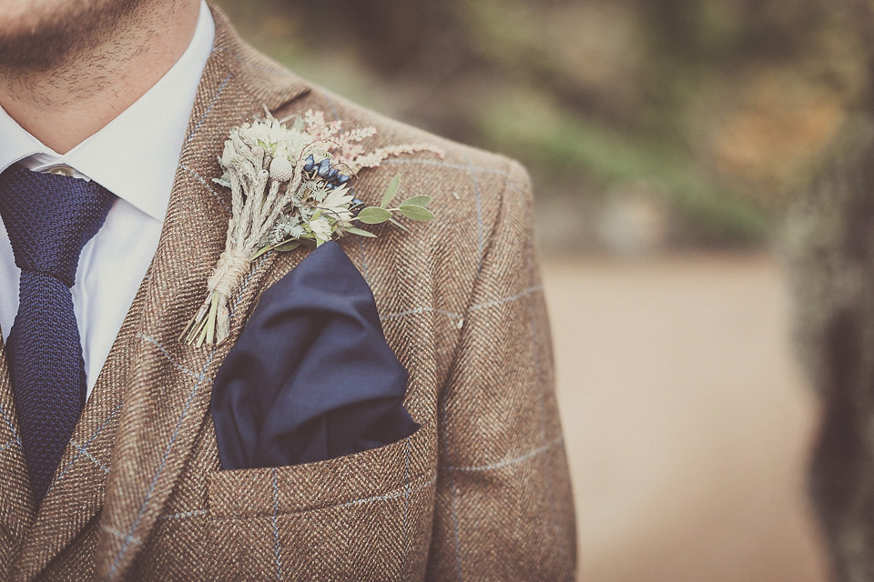 The bride wears YolanCris for her rustic, late Autumn barn wedding at Ramster Hall in Chiddingford, Surrey. Photography by Michelle Lindsell.