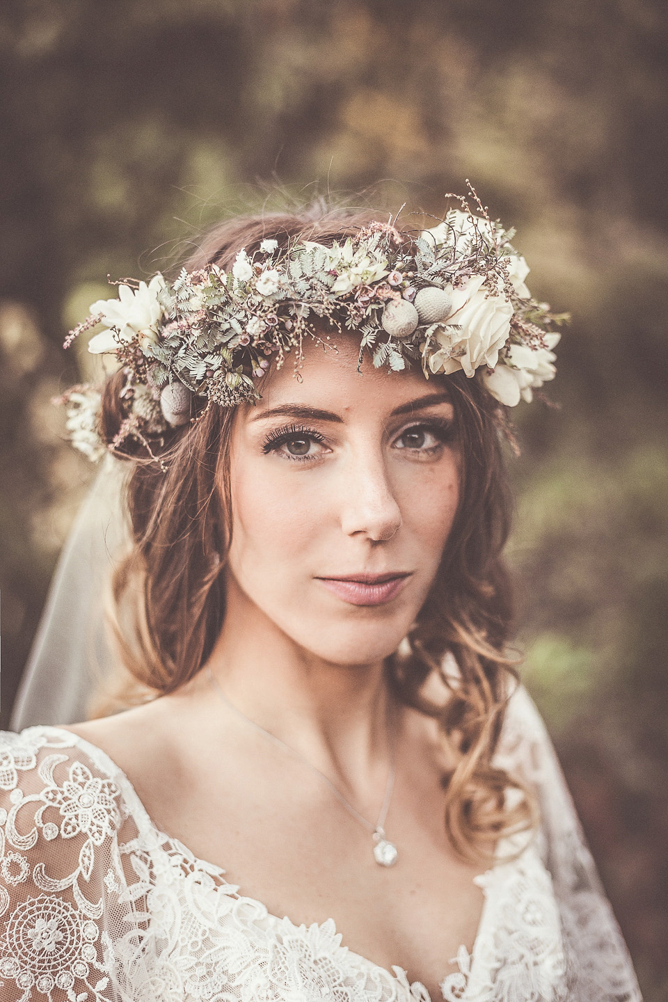 The bride wears YolanCris for her rustic, late Autumn barn wedding at Ramster Hall in Chiddingford, Surrey. Photography by Michelle Lindsell.