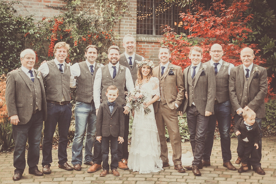 The bride wears YolanCris for her rustic, late Autumn barn wedding at Ramster Hall in Chiddingford, Surrey. Photography by Michelle Lindsell.