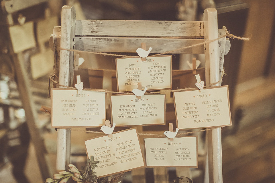 The bride wears YolanCris for her rustic, late Autumn barn wedding at Ramster Hall in Chiddingford, Surrey. Photography by Michelle Lindsell.