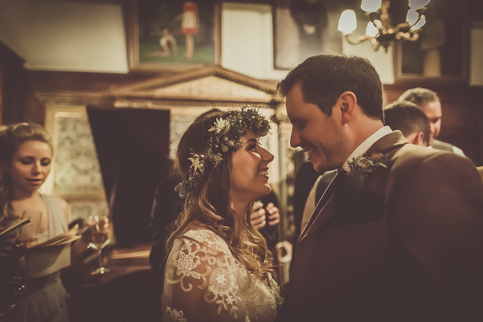 The bride wears YolanCris for her rustic, late Autumn barn wedding at Ramster Hall in Chiddingford, Surrey. Photography by Michelle Lindsell.