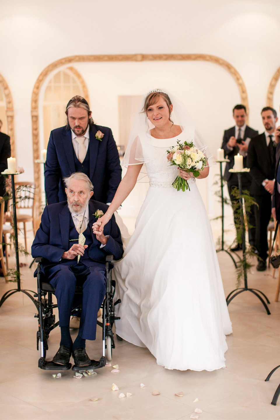 A blush pink and rose gold wedding at Northbrook Park in Surrey. Photography by Naomi Kenton. The bride wears Bridal Rosa Couture from The Bridal Rooms of Worcester.