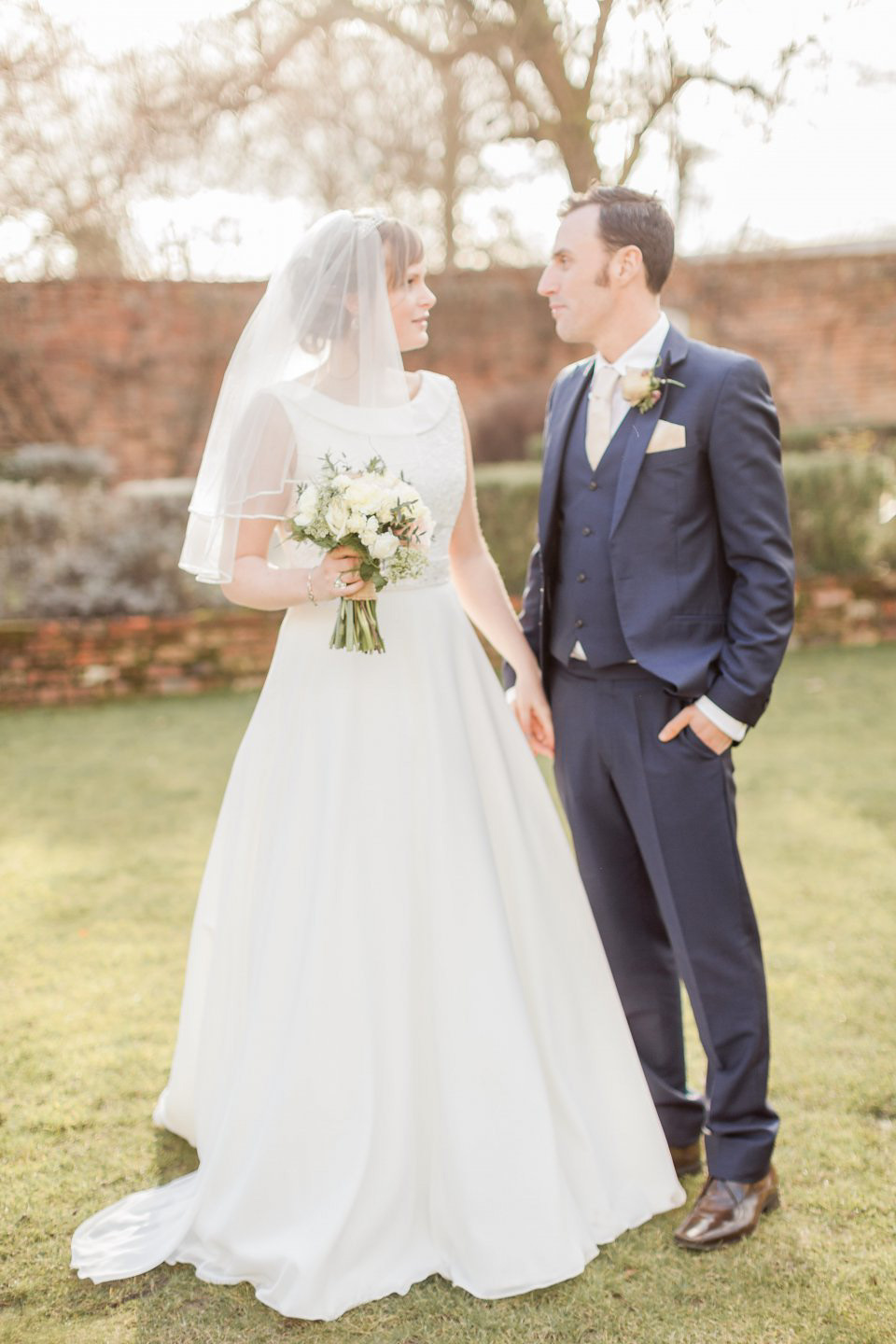 A blush pink and rose gold wedding at Northbrook Park in Surrey. Photography by Naomi Kenton. The bride wears Bridal Rosa Couture from The Bridal Rooms of Worcester.