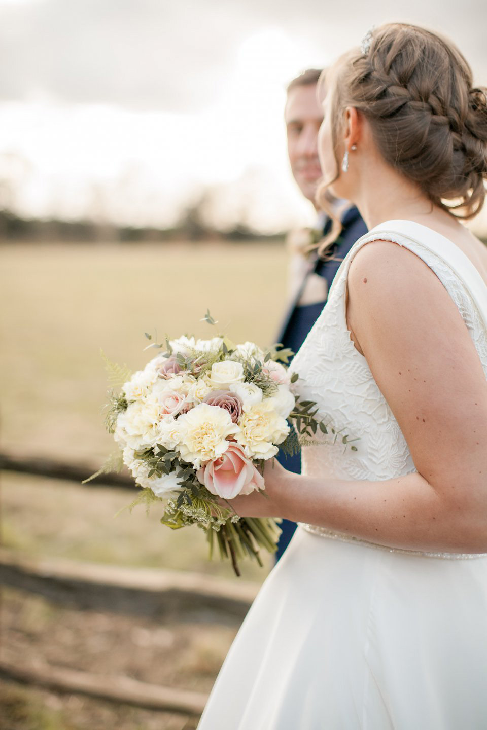 A blush pink and rose gold wedding at Northbrook Park in Surrey. Photography by Naomi Kenton. The bride wears Bridal Rosa Couture from The Bridal Rooms of Worcester.