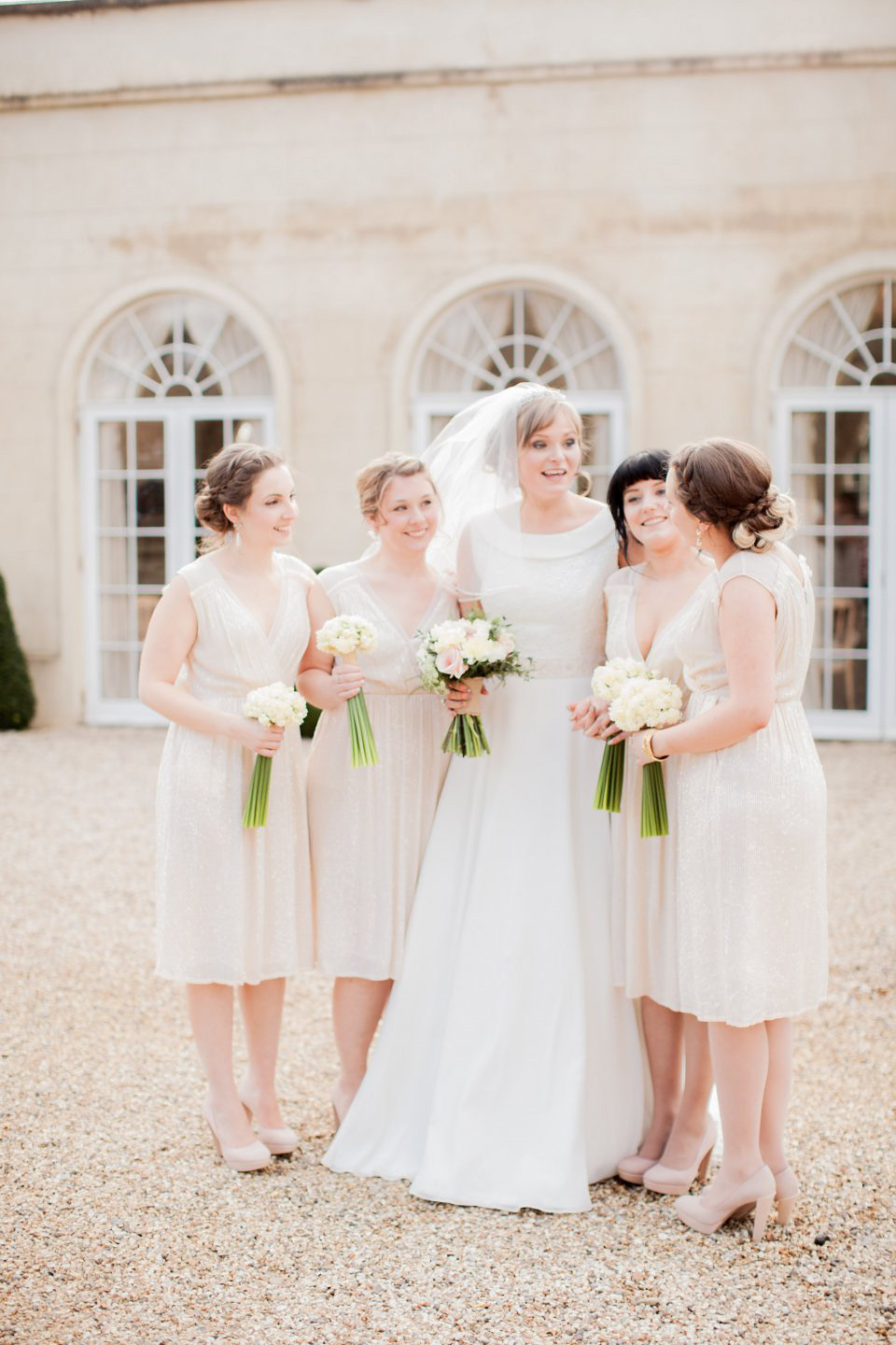 A blush pink and rose gold wedding at Northbrook Park in Surrey. Photography by Naomi Kenton. The bride wears Bridal Rosa Couture from The Bridal Rooms of Worcester.