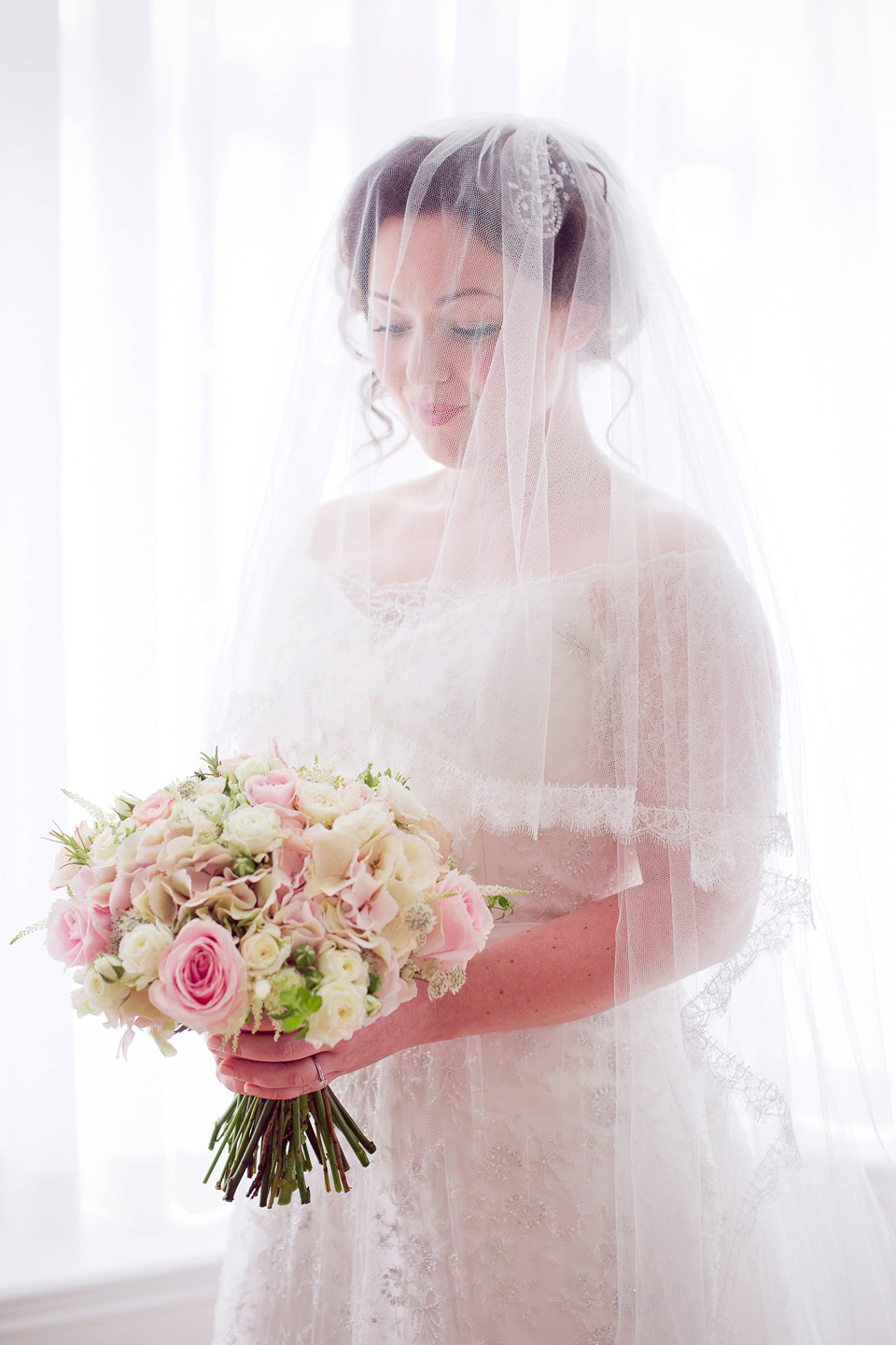 The bride created her own dress, veil and bridesmaids dresses for her Railway Museum wedding. Photography by Emma Sekhon.