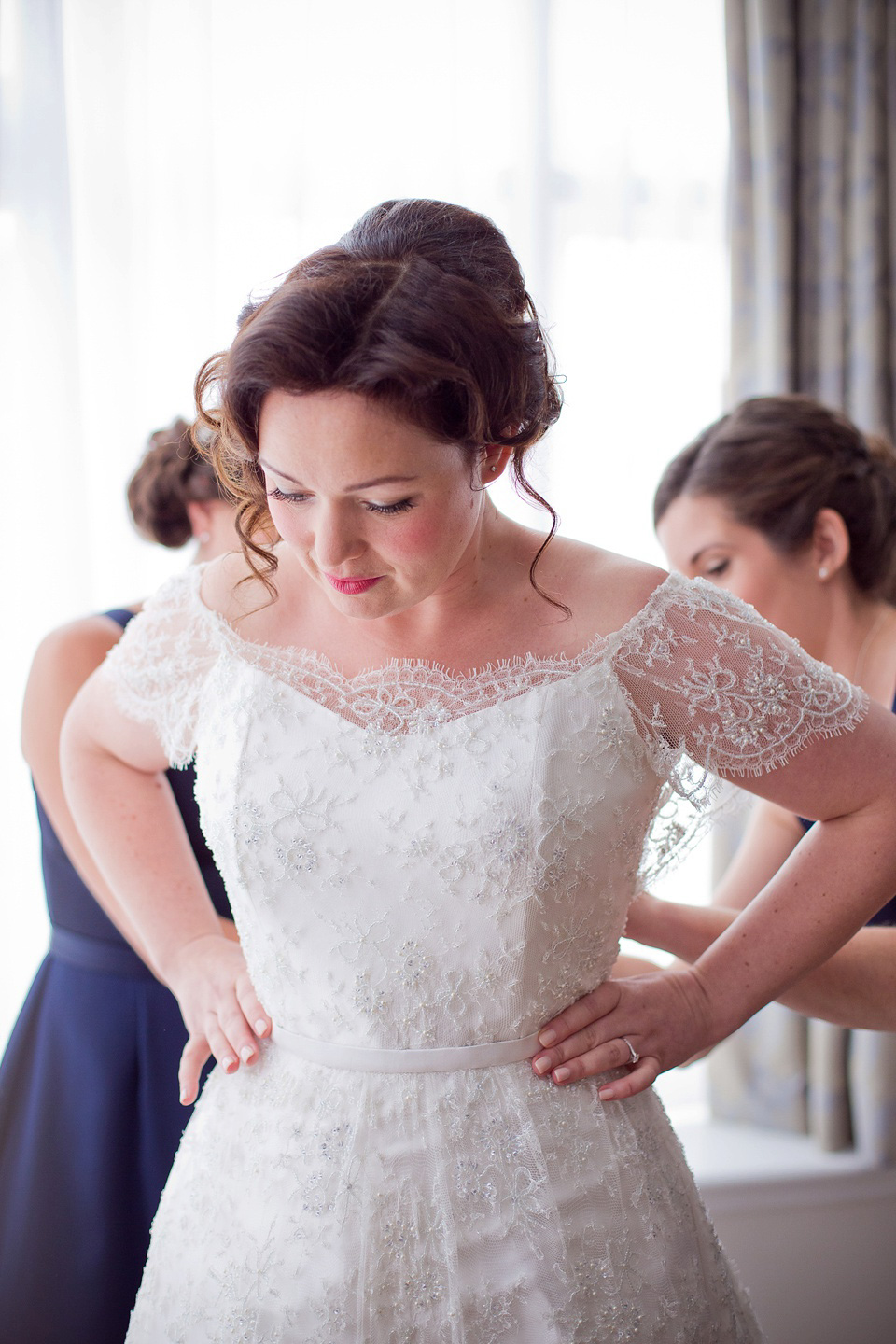 The bride created her own dress, veil and bridesmaids dresses for her Railway Museum wedding. Photography by Emma Sekhon.