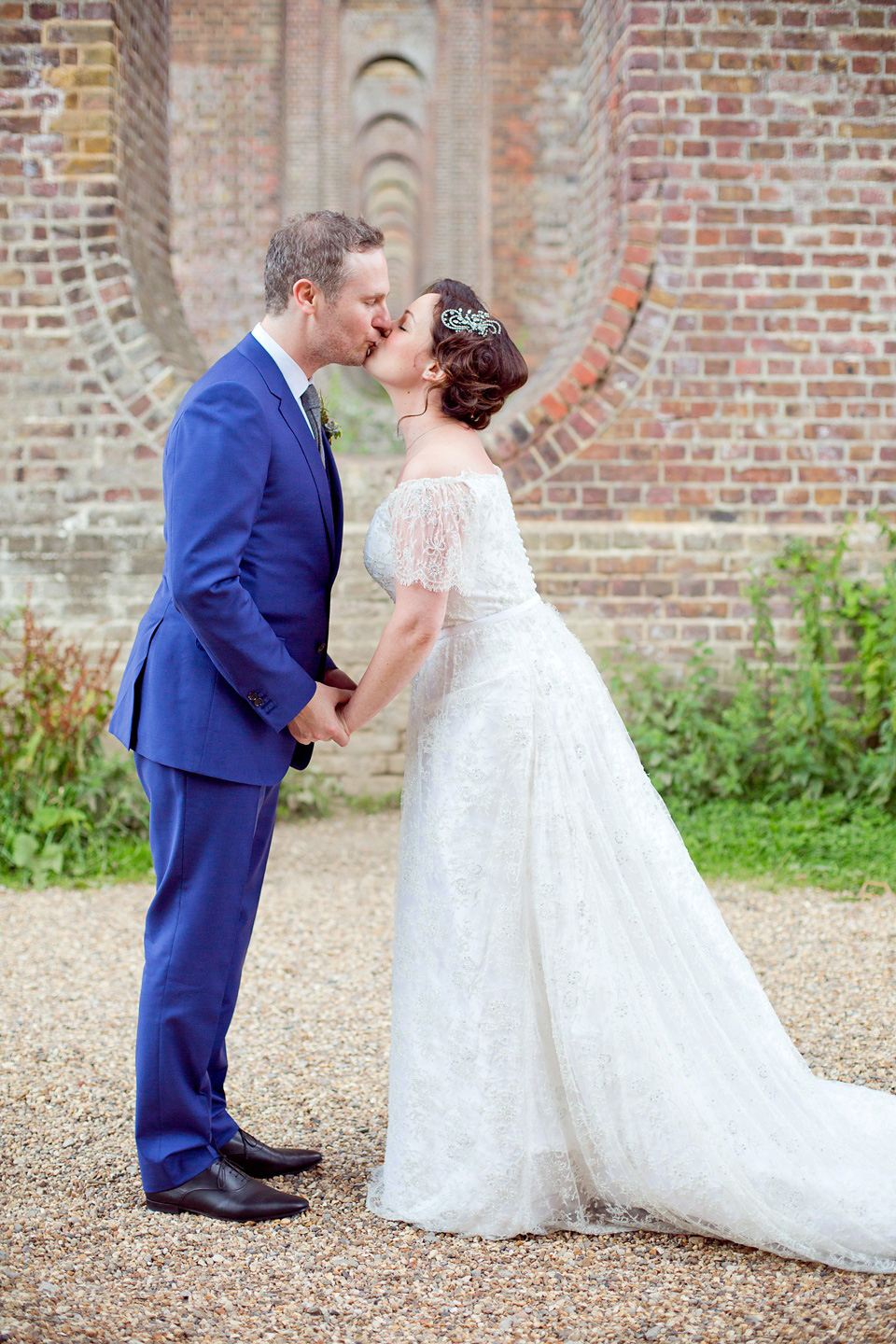 The bride created her own dress, veil and bridesmaids dresses for her Railway Museum wedding. Photography by Emma Sekhon.