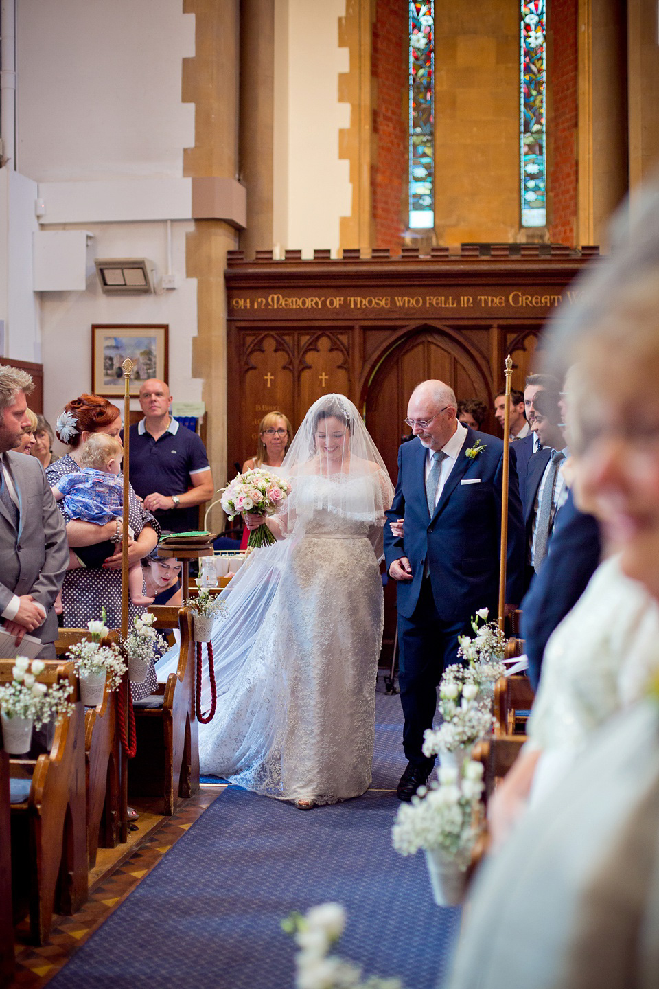 The bride created her own dress, veil and bridesmaids dresses for her Railway Museum wedding. Photography by Emma Sekhon.