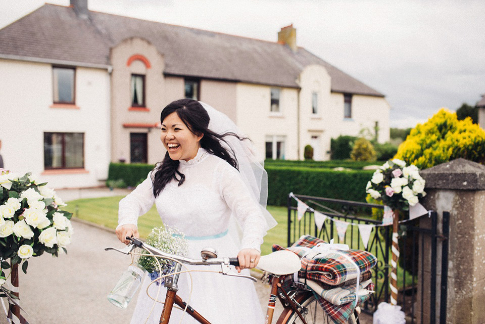 A 1980's vintage wedding dress for a DIY, handmade and craft filled village hall wedding in Scotland. Photography by Donna Murray.