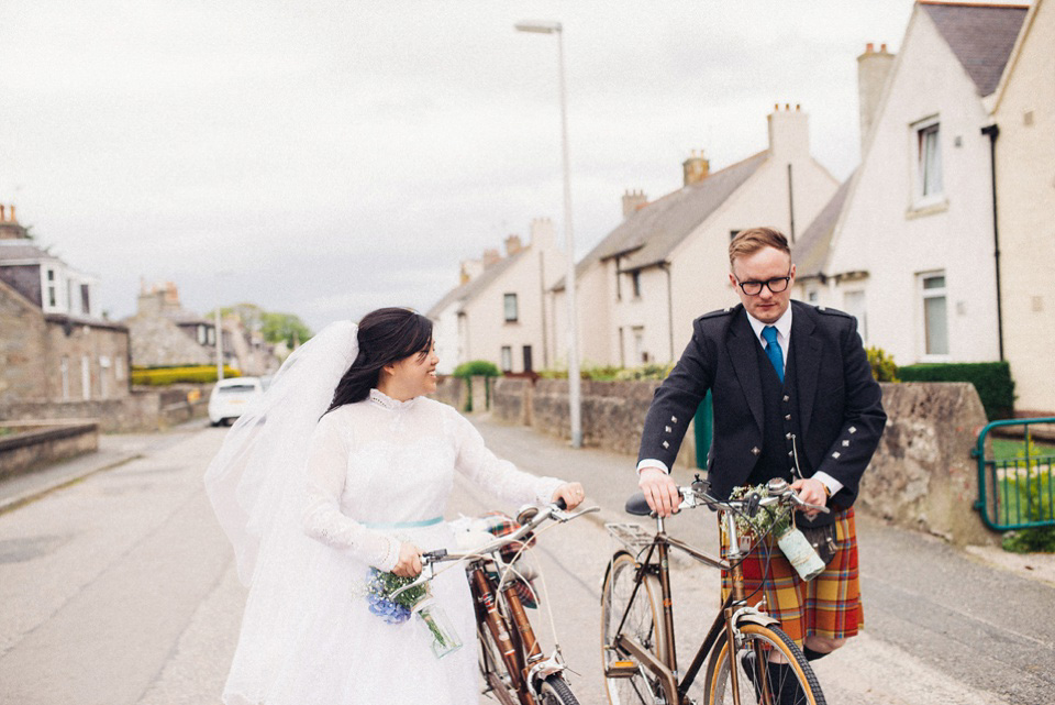 A 1980's vintage wedding dress for a DIY, handmade and craft filled village hall wedding in Scotland. Photography by Donna Murray. A 1980's vintage wedding dress for a DIY, handmade and craft filled village hall wedding in Scotland. Photography by Donna Murray.