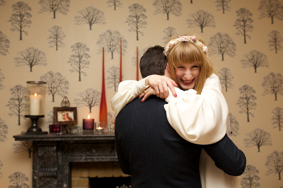 A 1970's Ossie Clarke inspired wedding dress for a stylish bride and her Winter Wedding in London. Photography by Sharon Cooper.