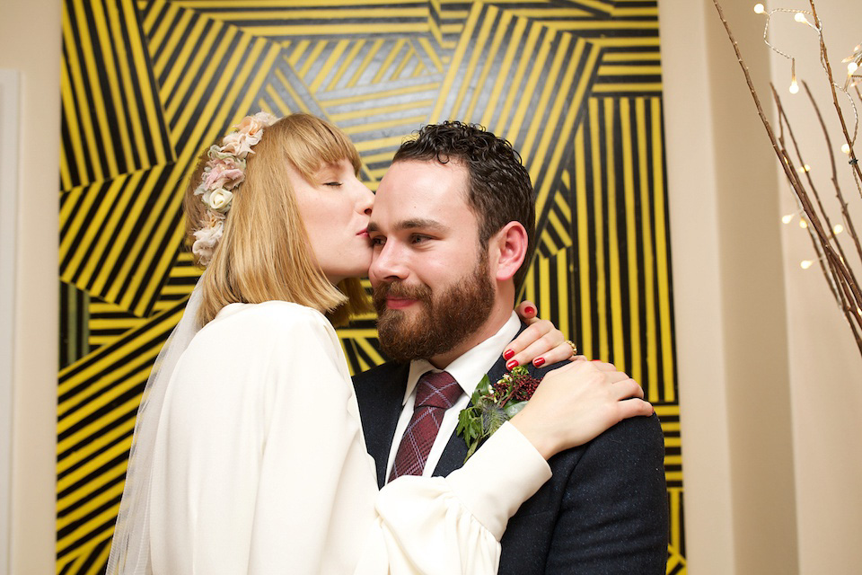 A 1970's Ossie Clarke inspired wedding dress for a stylish bride and her Winter Wedding in London. Photography by Sharon Cooper.