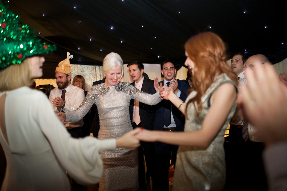 A 1970's Ossie Clarke inspired wedding dress for a stylish bride and her Winter Wedding in London. Photography by Sharon Cooper.