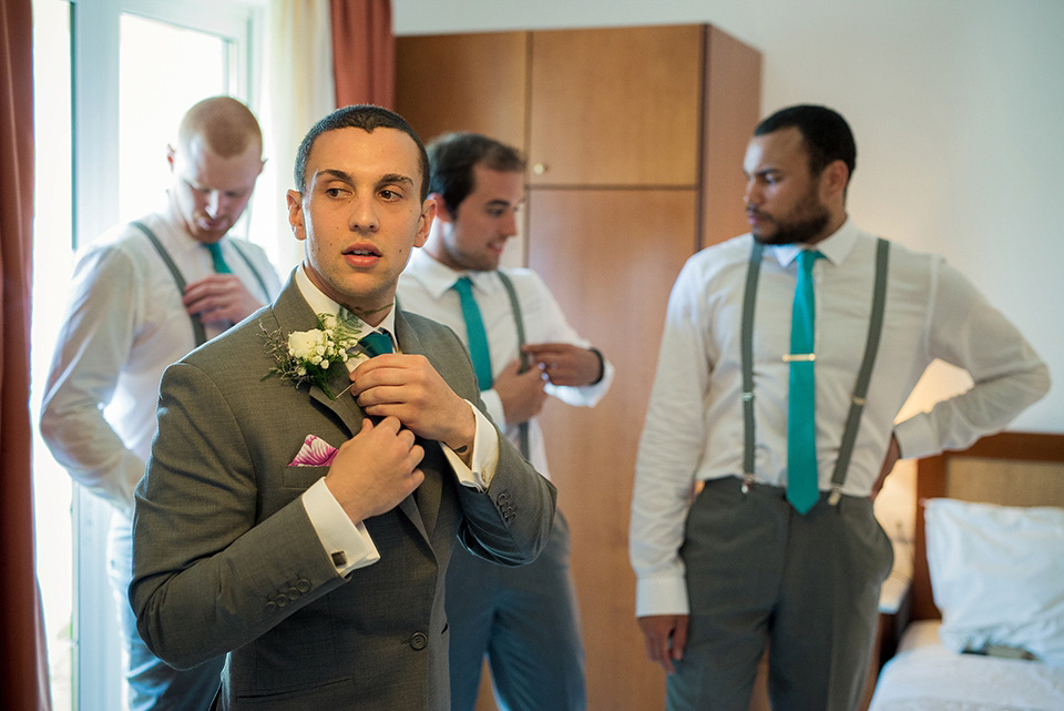 A destinatoin wedding in Zakynthos, Greece. The bride wears Ronald Joyce and her maids wear twobirds Bridesmaid.  Photography by Nick Kontostavlakis.