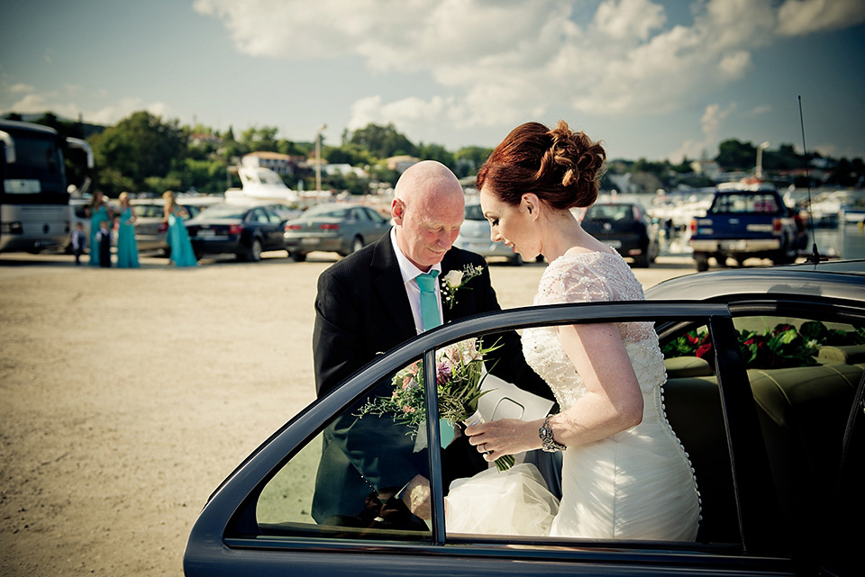 A destinatoin wedding in Zakynthos, Greece. The bride wears Ronald Joyce and her maids wear twobirds Bridesmaid.  Photography by Nick Kontostavlakis.