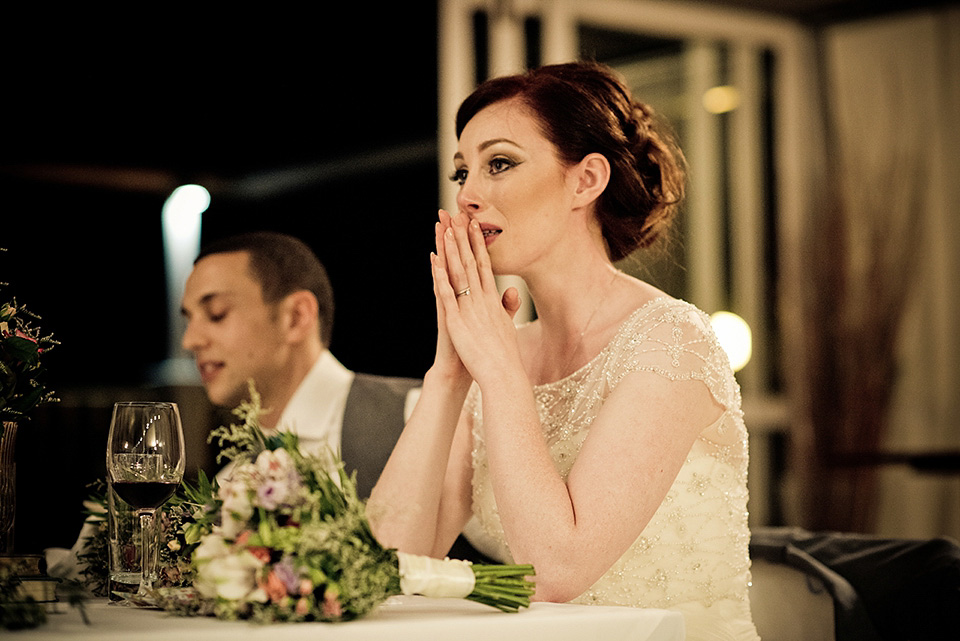 A destinatoin wedding in Zakynthos, Greece. The bride wears Ronald Joyce and her maids wear twobirds Bridesmaid.  Photography by Nick Kontostavlakis.