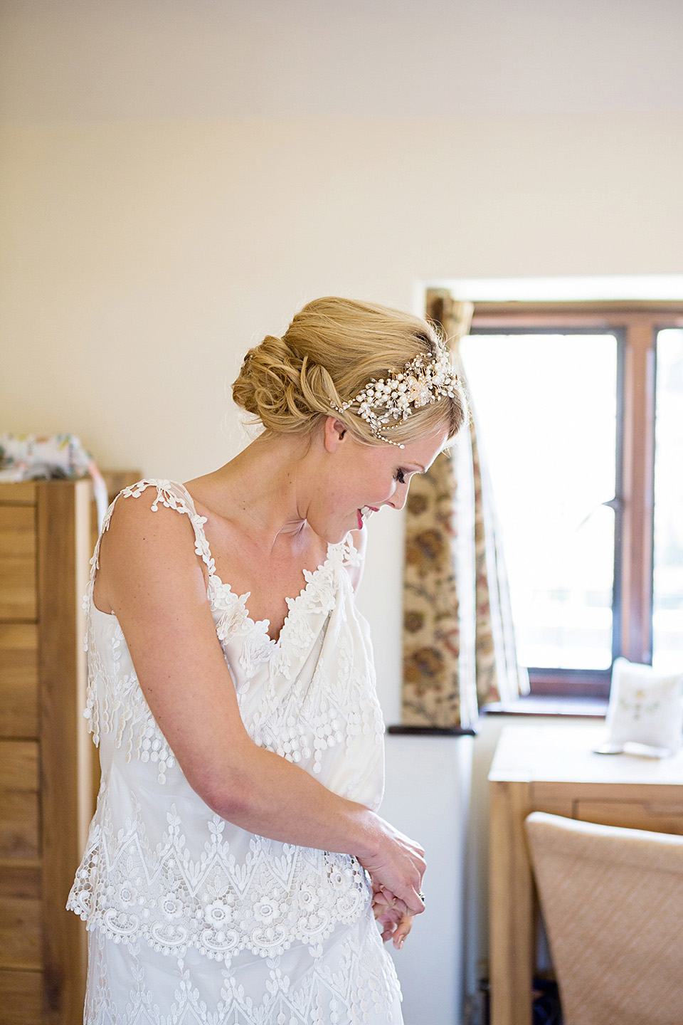 An elegant English wedding in the Spring. The bride wears Kristene by Claire Pettibone. Photography by Jo Hastings.