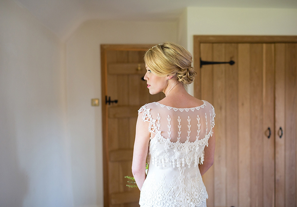 An elegant English wedding in the Spring. The bride wears Kristene by Claire Pettibone. Photography by Jo Hastings.