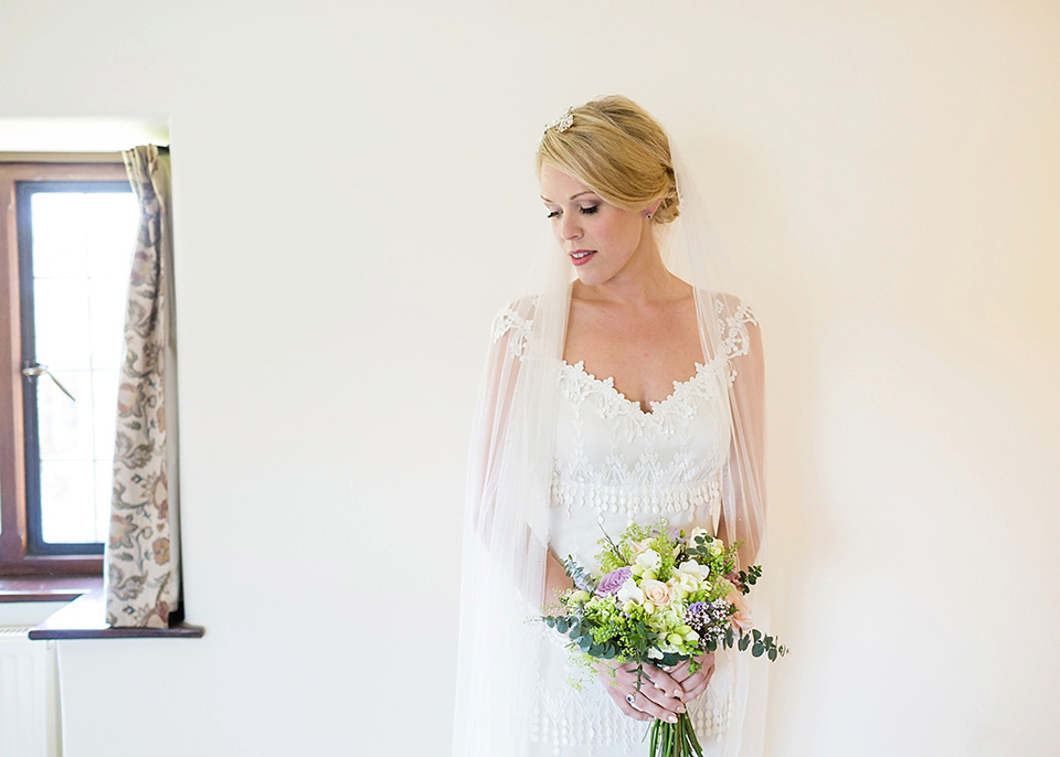 An elegant English wedding in the Spring. The bride wears Kristene by Claire Pettibone. Photography by Jo Hastings.