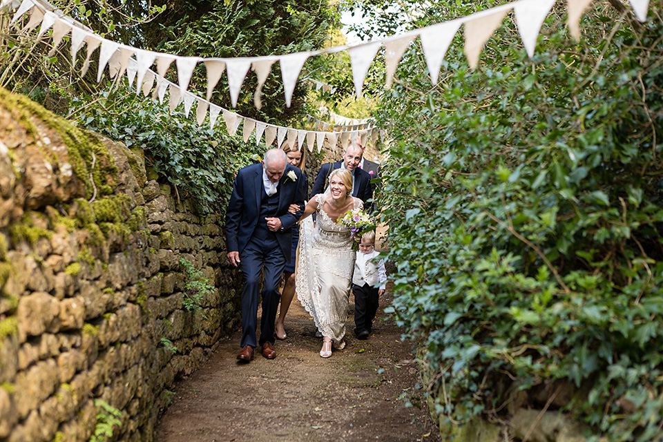 An elegant English wedding in the Spring. The bride wears Kristene by Claire Pettibone. Photography by Jo Hastings.