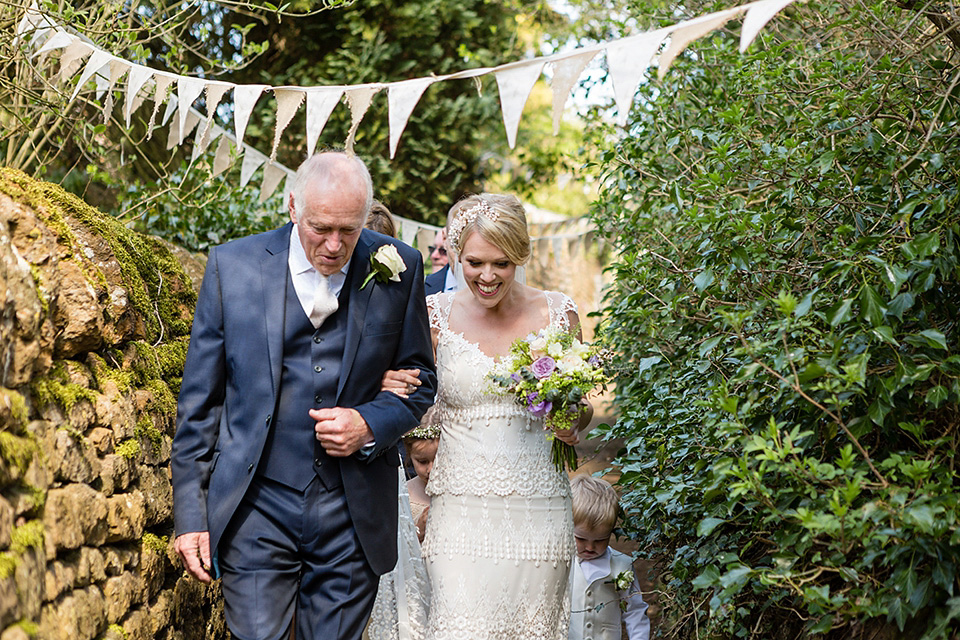 An elegant English wedding in the Spring. The bride wears Kristene by Claire Pettibone. Photography by Jo Hastings.