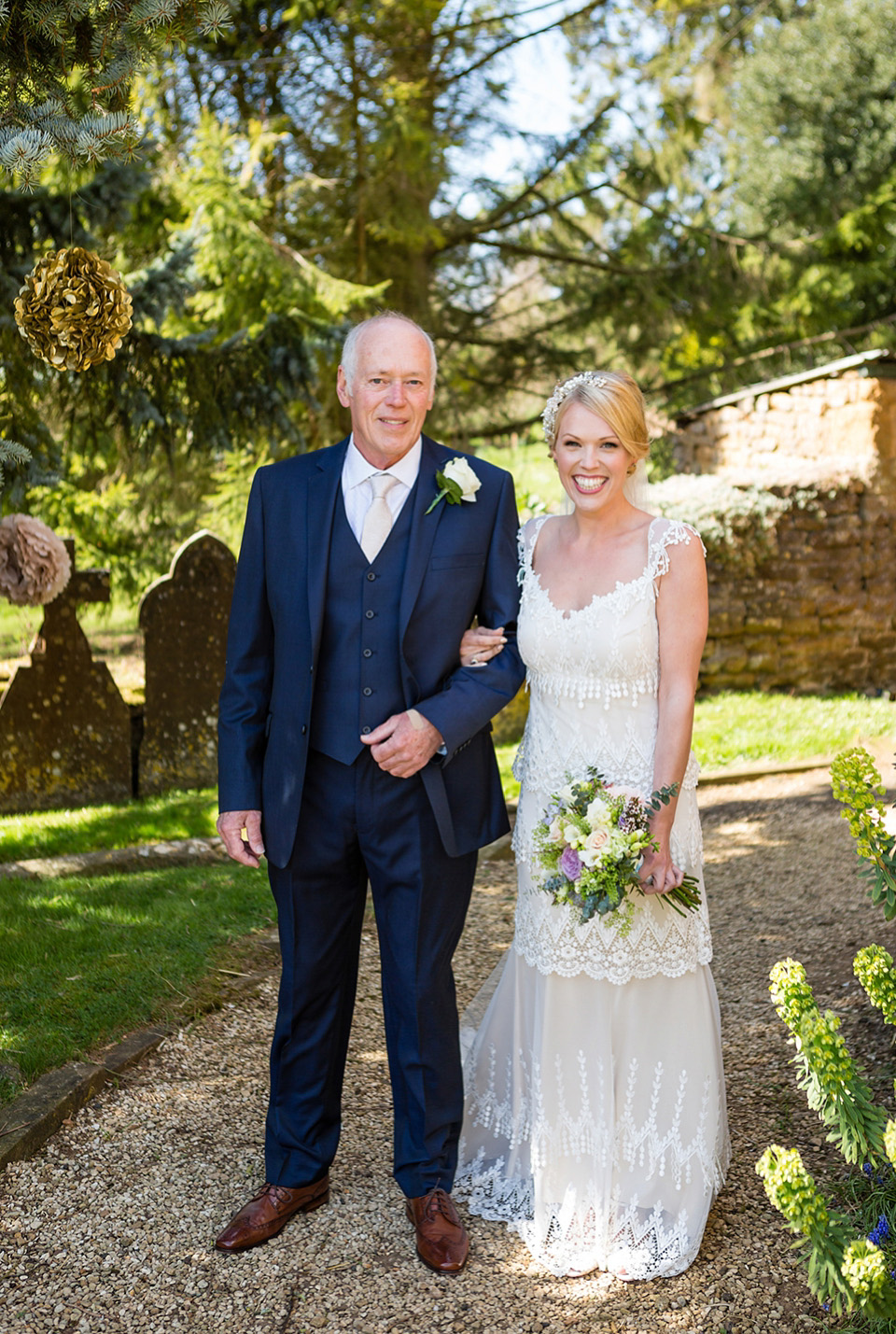 An elegant English wedding in the Spring. The bride wears Kristene by Claire Pettibone. Photography by Jo Hastings.