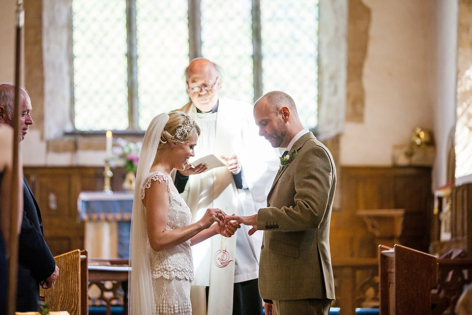 An elegant English wedding in the Spring. The bride wears Kristene by Claire Pettibone. Photography by Jo Hastings.