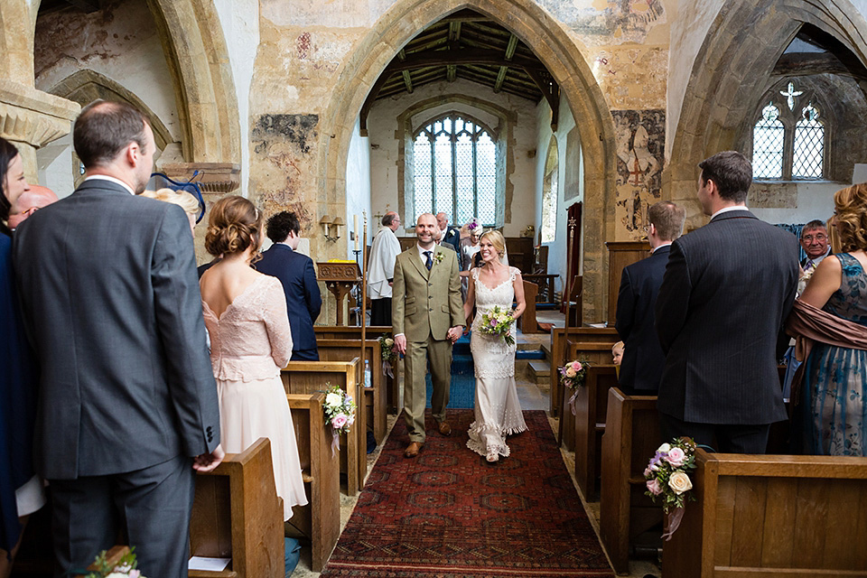 An elegant English wedding in the Spring. The bride wears Kristene by Claire Pettibone. Photography by Jo Hastings.