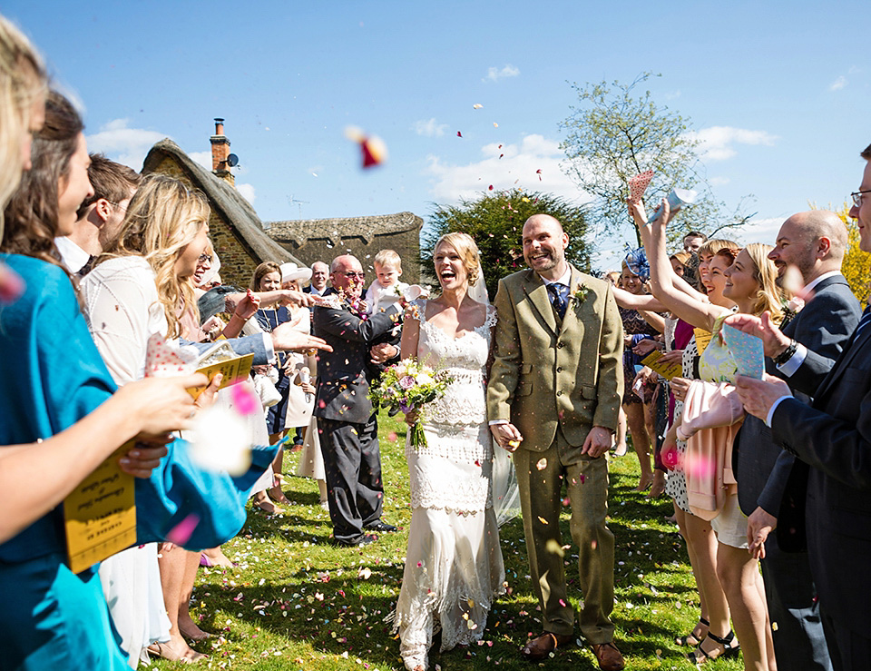 An elegant English wedding in the Spring. The bride wears Kristene by Claire Pettibone. Photography by Jo Hastings.