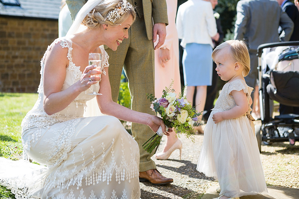 An elegant English wedding in the Spring. The bride wears Kristene by Claire Pettibone. Photography by Jo Hastings.