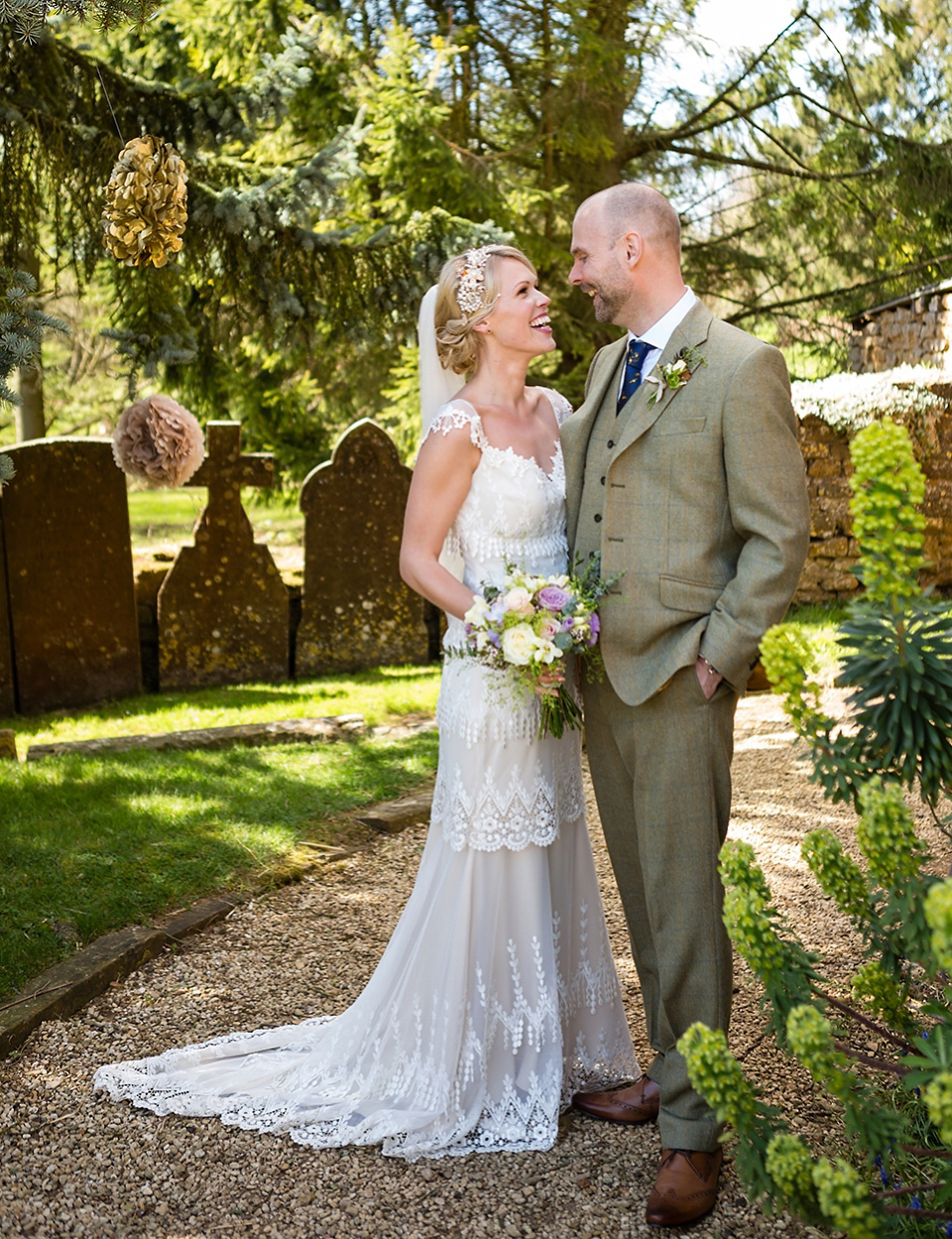 An elegant English wedding in the Spring. The bride wears Kristene by Claire Pettibone. Photography by Jo Hastings.