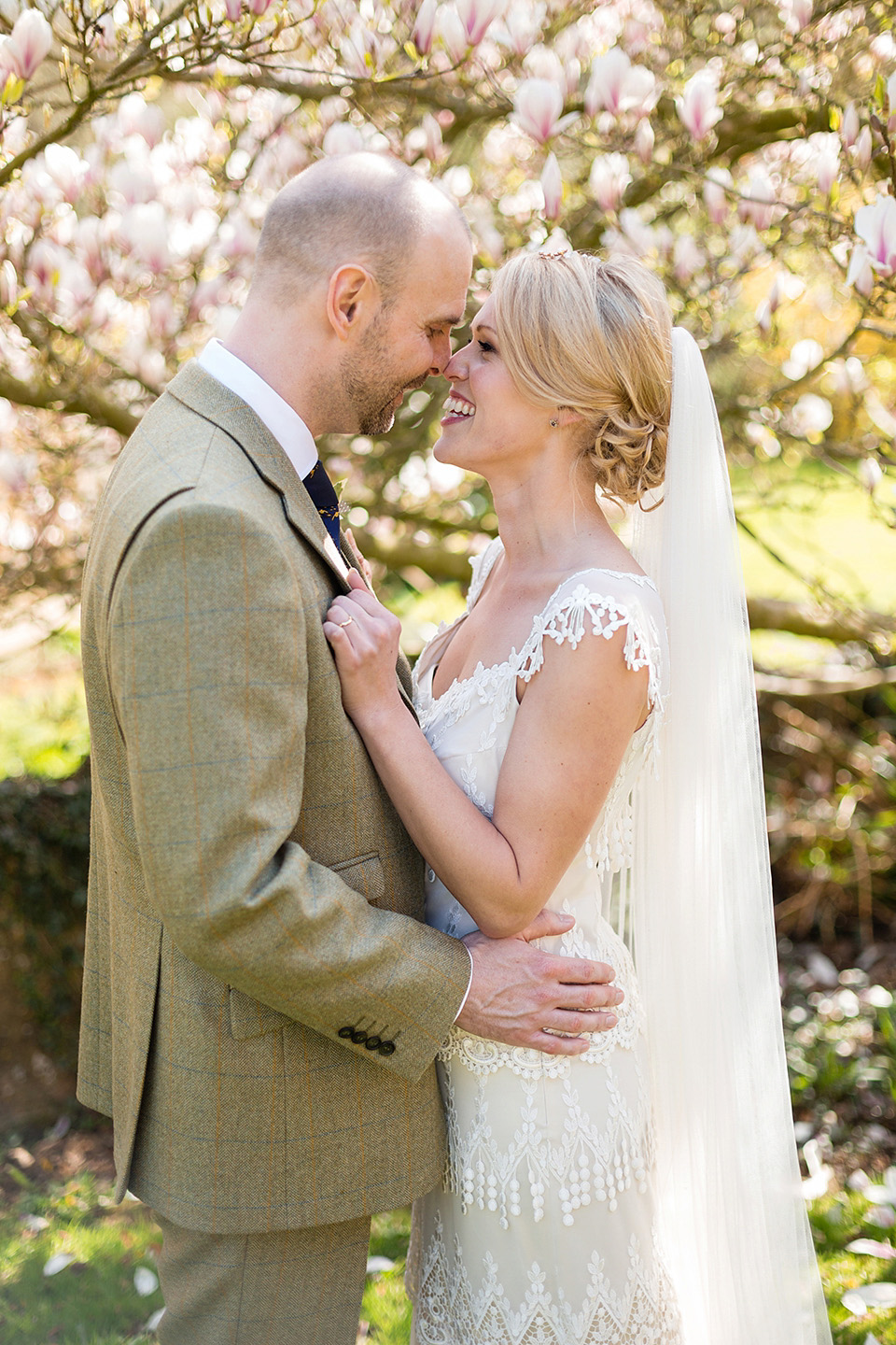 An elegant English wedding in the Spring. The bride wears Kristene by Claire Pettibone. Photography by Jo Hastings.