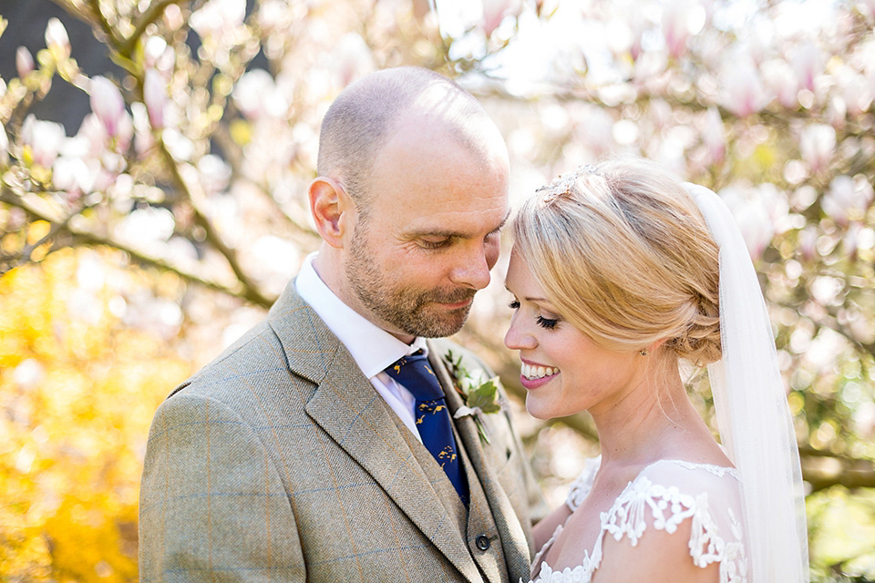 An elegant English wedding in the Spring. The bride wears Kristene by Claire Pettibone. Photography by Jo Hastings.