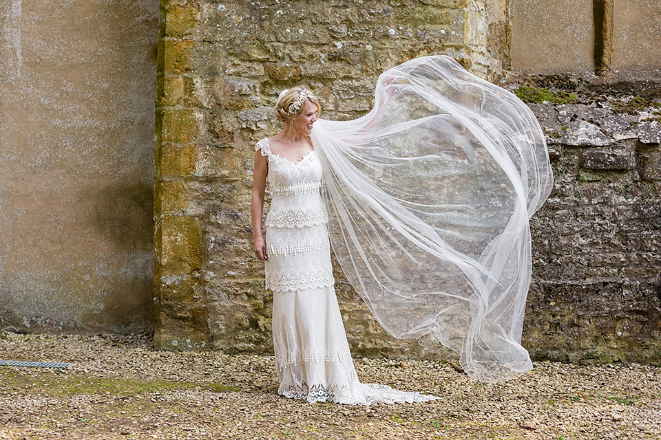 An elegant English wedding in the Spring. The bride wears Kristene by Claire Pettibone. Photography by Jo Hastings.