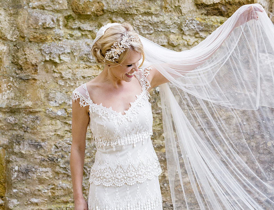 An elegant English wedding in the Spring. The bride wears Kristene by Claire Pettibone. Photography by Jo Hastings.