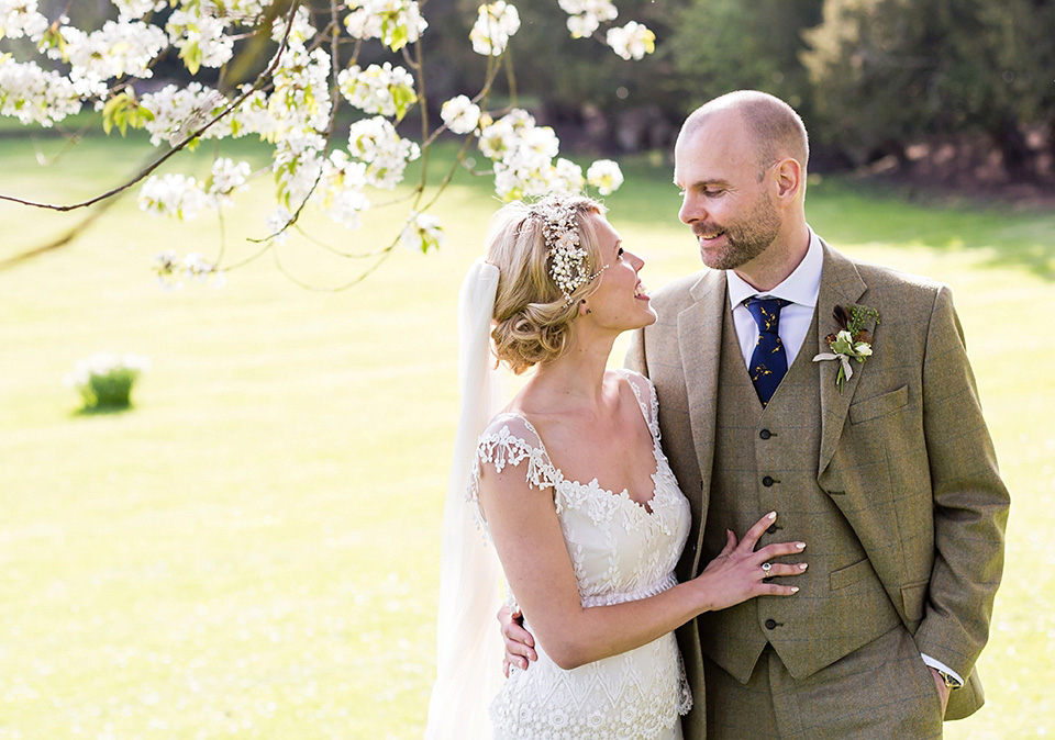 An elegant English wedding in the Spring. The bride wears Kristene by Claire Pettibone. Photography by Jo Hastings.