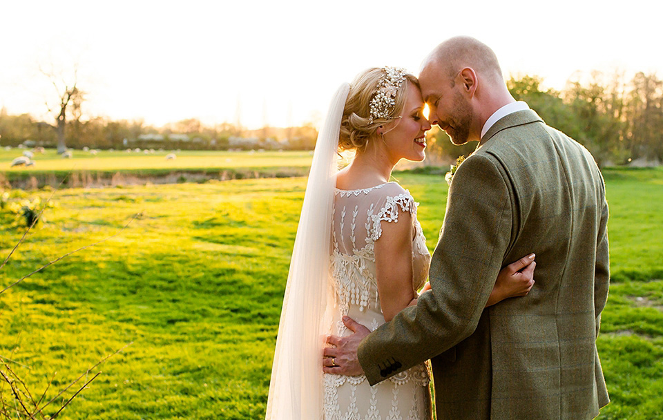 An elegant English wedding in the Spring. The bride wears Kristene by Claire Pettibone. Photography by Jo Hastings.