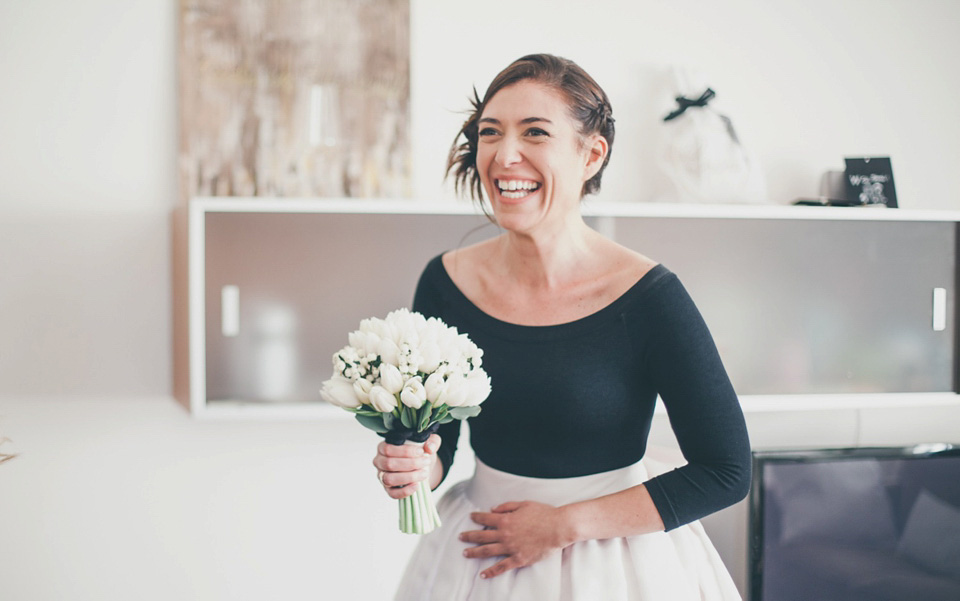 A bride wearing black and white bridal separates for her elegant Italian wedding. Photography by Infraordinario Studio.
