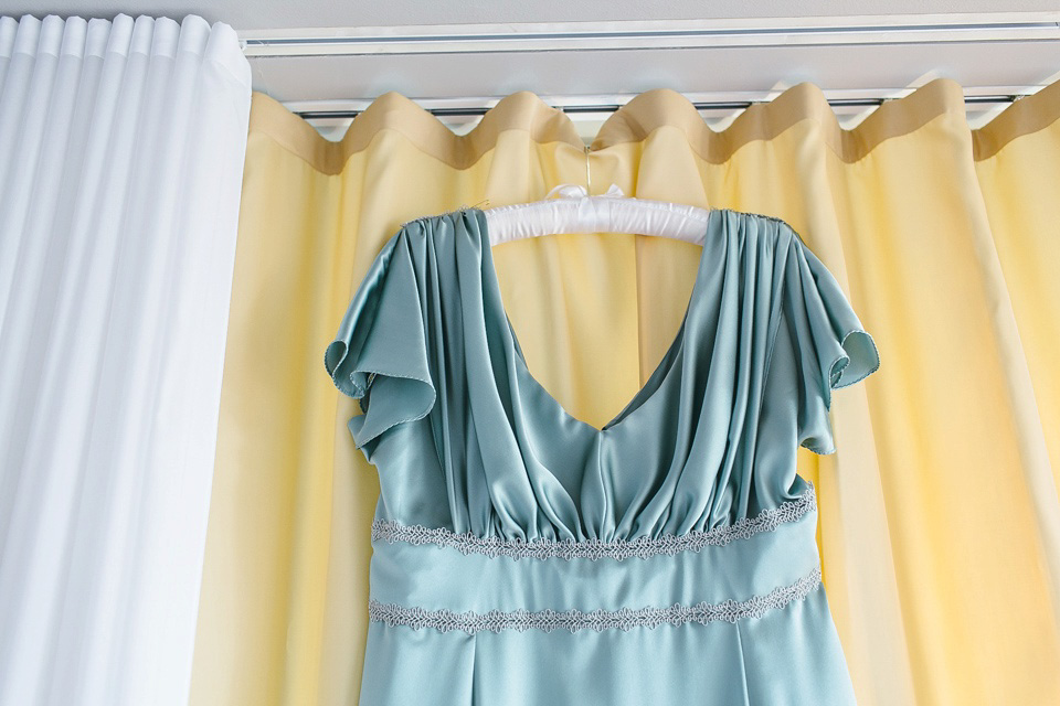 A pale green silk dress by The State of Grace, for an elegant London Wedding. Photography by Lee Garland.