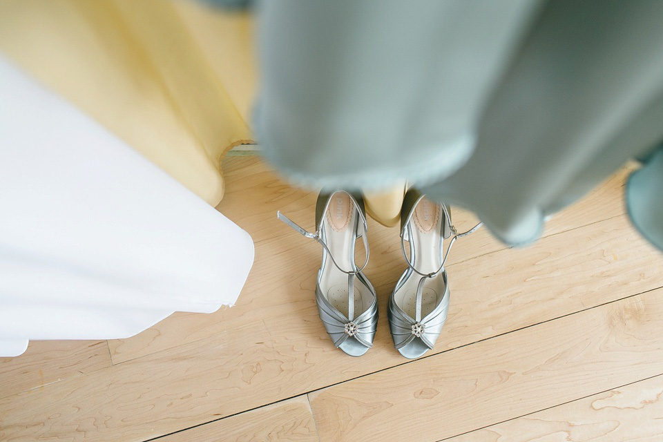 A pale green silk dress by The State of Grace, for an elegant London Wedding. Photography by Lee Garland.